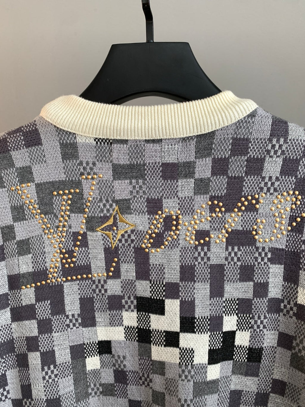 Louis Vuitton sweater back with large gold-tone check pattern logo and cream ribbed collar