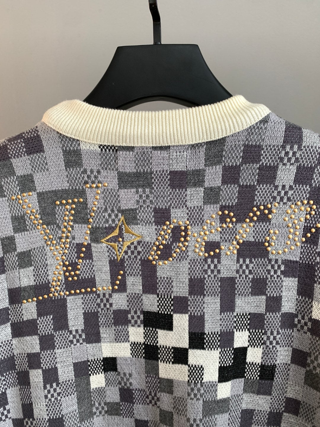 Louis Vuitton sweater back with large gold-tone check pattern logo and cream ribbed collar