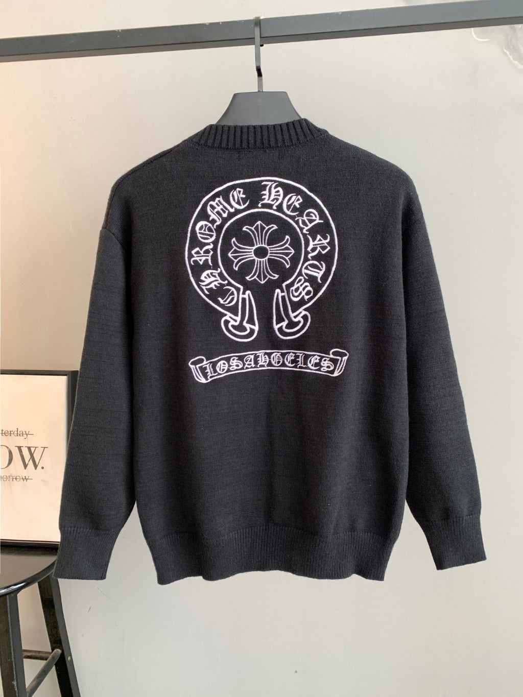 Charcoal knit long-sleeve sweater with large back graphic and ribbed crew neckline