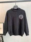 Charcoal knit long-sleeve sweater with ribbed crew neck and small front logo patch