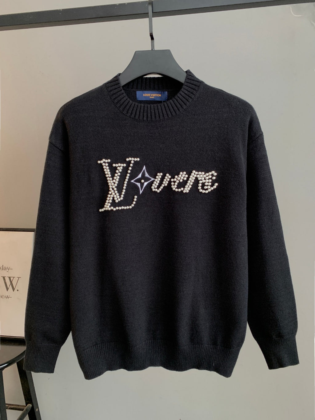 Charcoal knit crewneck pullover sweater with jeweled LV logo front