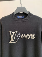 Charcoal knit crewneck pullover sweater with jeweled LV Vive logo front