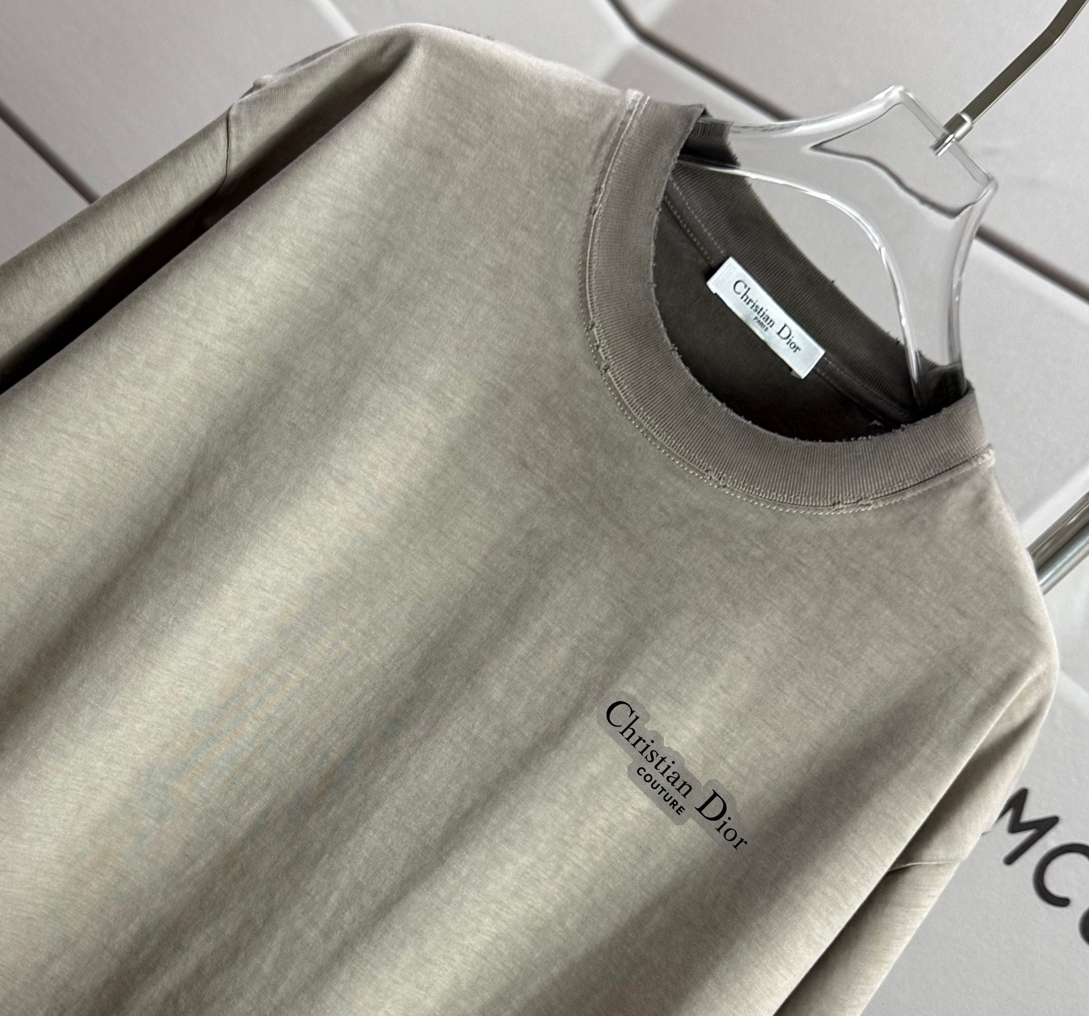 Khaki short-sleeve T-shirt with Christian Dior logo on front chest