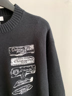 Dark knit sweater with stacked Christian Dior logo patches on the chest