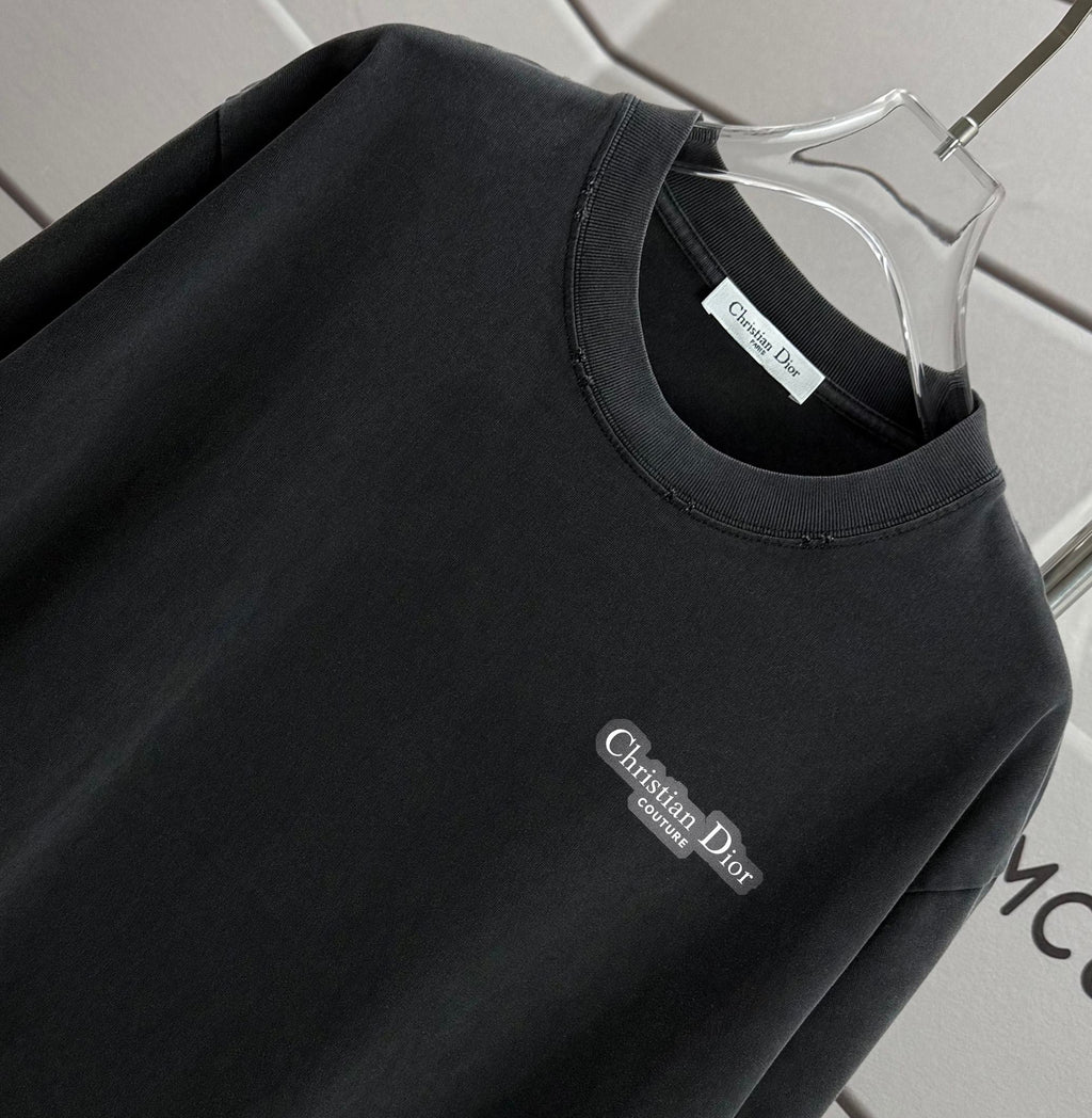 Black Dior T-shirt, crew neck and small chest Dior logo close-up