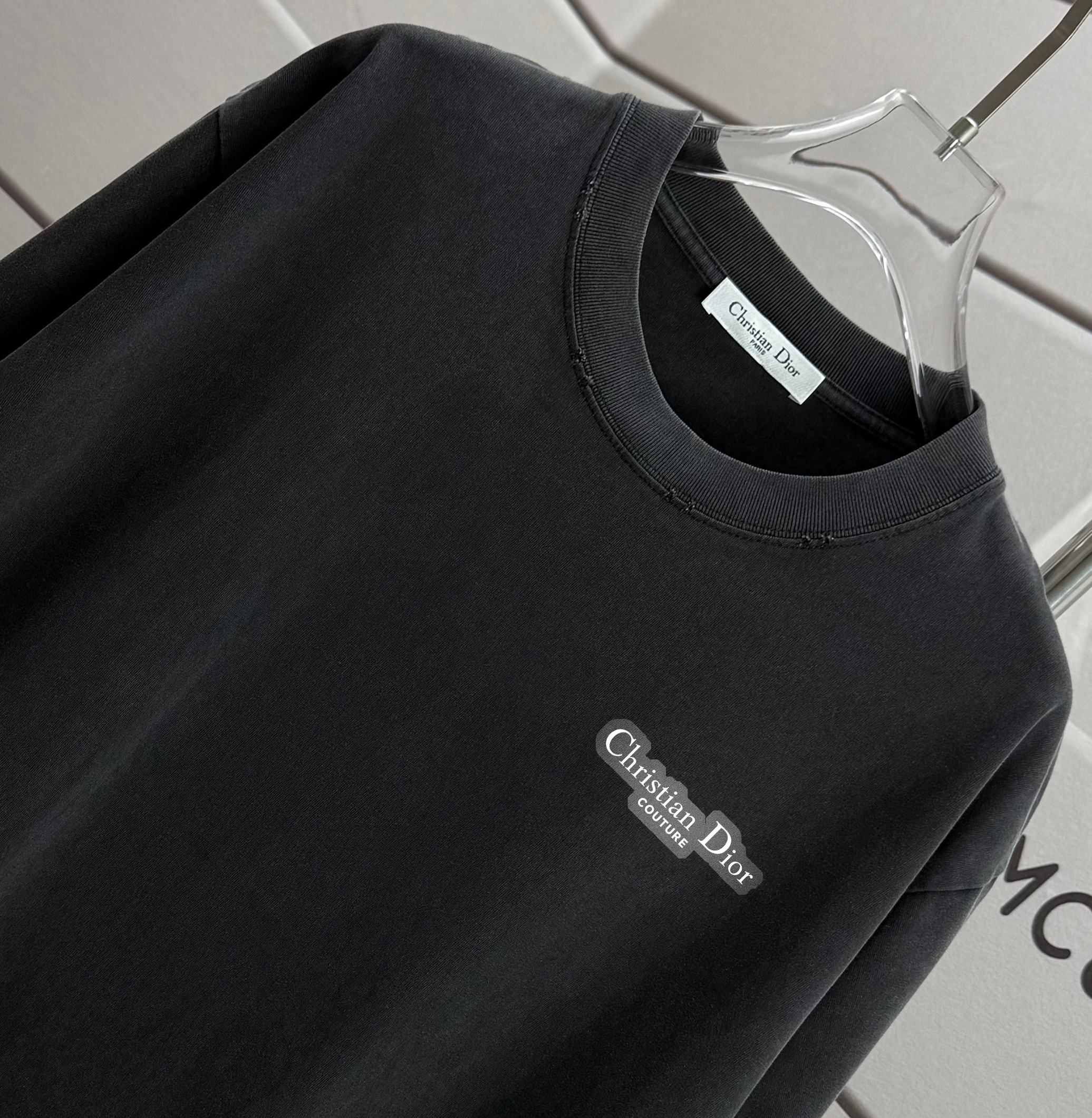 Black Dior T-shirt, crew neck and small chest Dior logo close-up