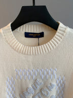 Cream ribbed crewneck sweater with Louis Vuitton label and rhinestone logo detail