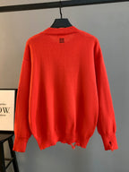 Givenchy red knit sweater, back view with small logo near neckline