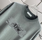 Short-sleeve T-shirt in muted green with Dior chest graphic and crew neck
