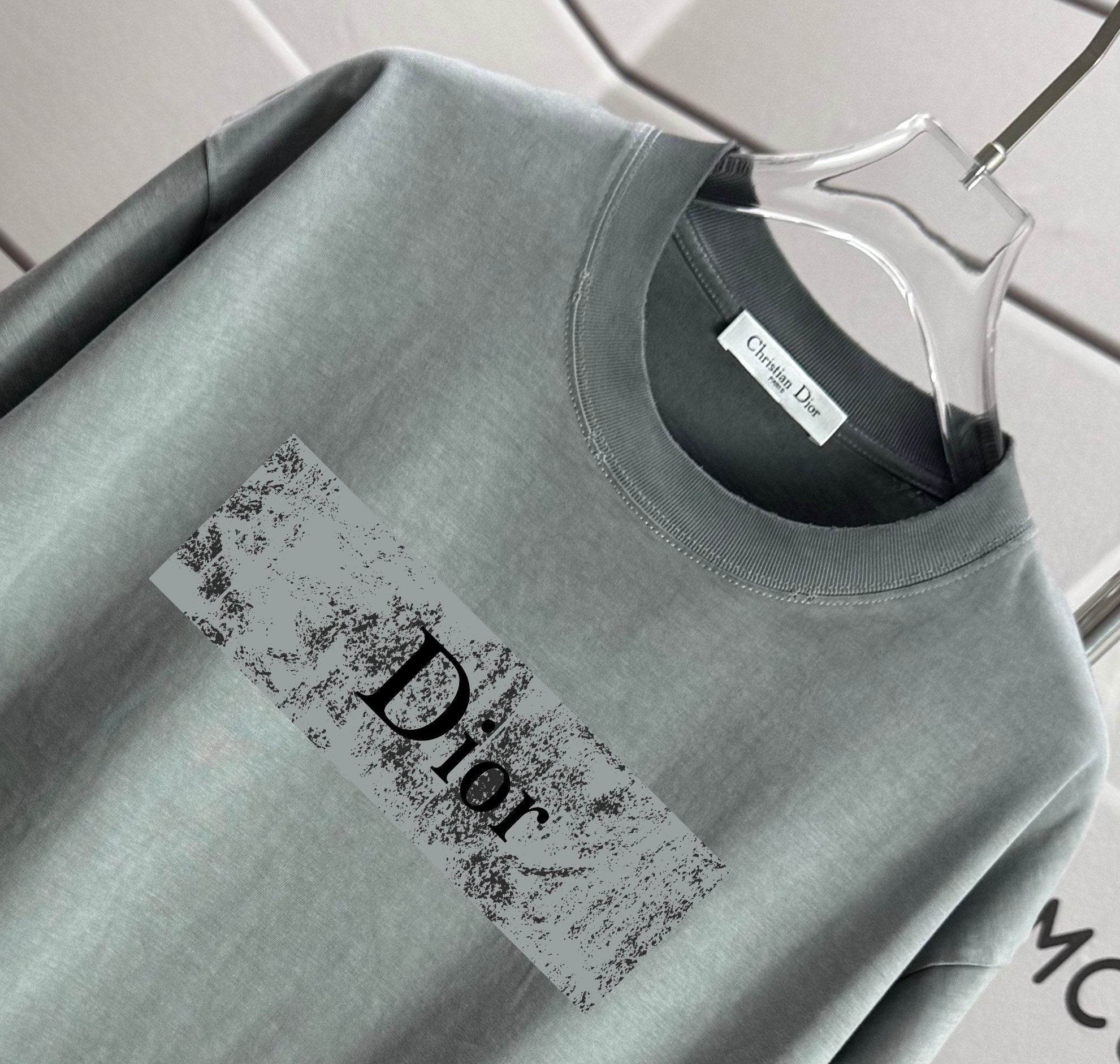 Short-sleeve T-shirt in muted green with Dior chest graphic and crew neck