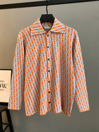 Dior long-sleeve shirt with orange-and-blue repeating logo pattern, button front