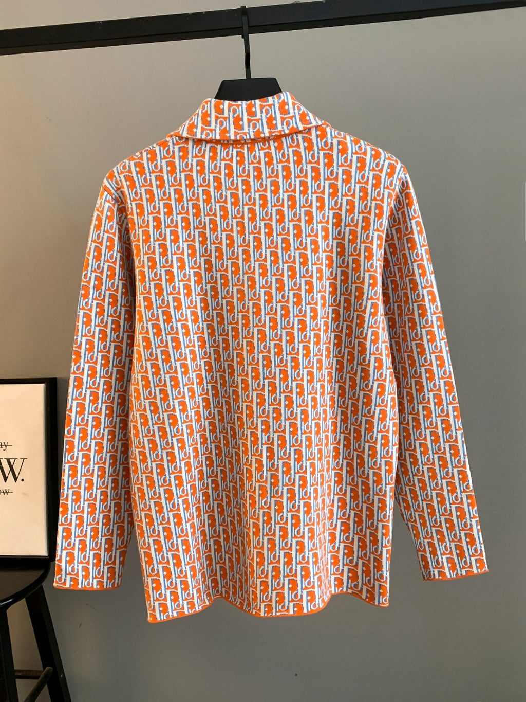 Dior long-sleeve shirt with orange-and-blue repeating logo pattern, full front view