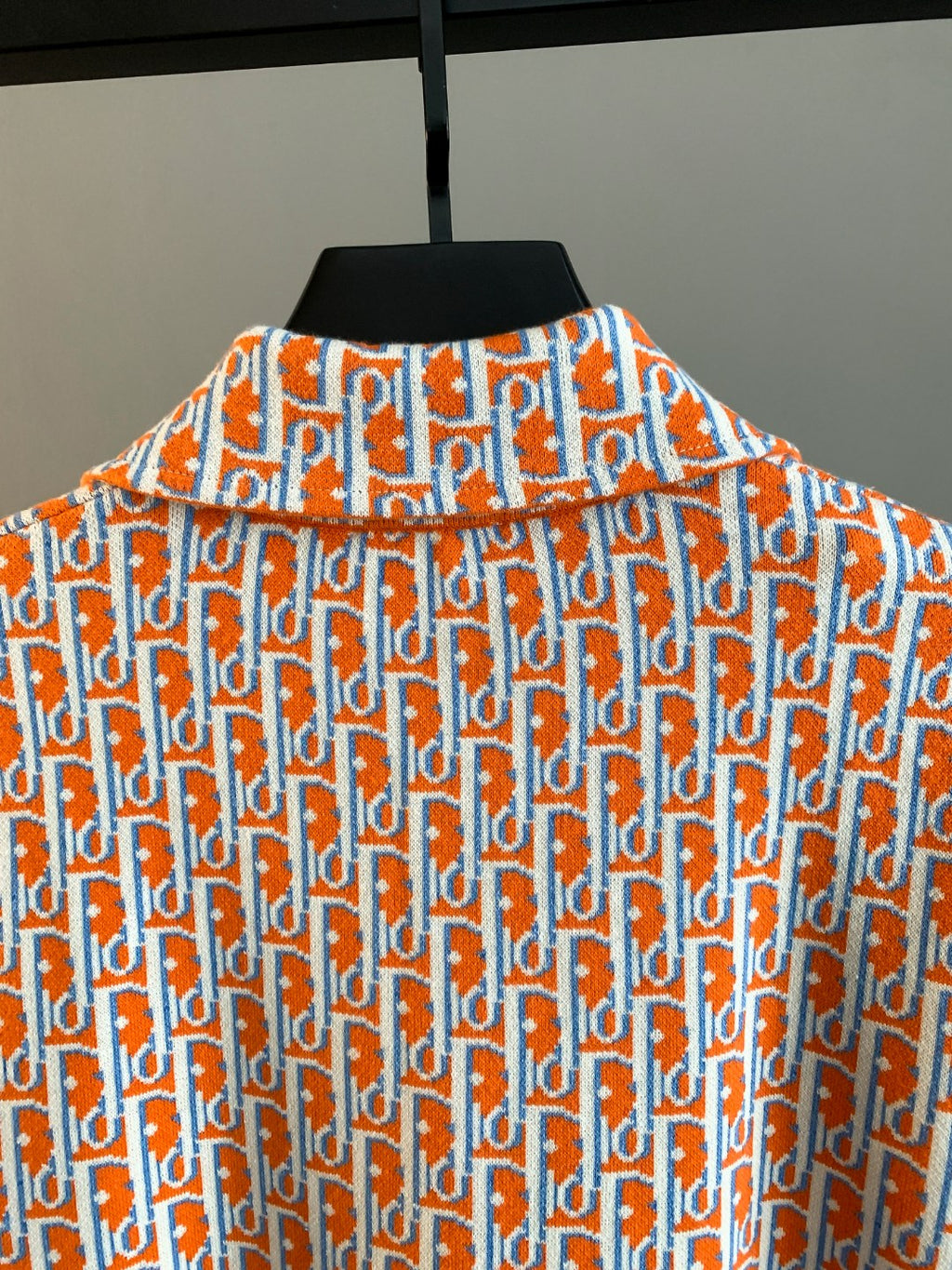 Dior logo-print long-sleeve shirt, back view with high collar and repeating pattern