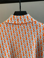 Dior logo-print long-sleeve shirt, back view with high collar and repeating pattern