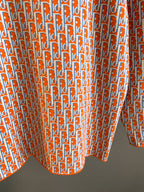 Dior logo-print long-sleeve shirt, back panel with orange-and-blue repeating pattern