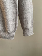 Heather gray knit sweater sleeves and ribbed cuffs