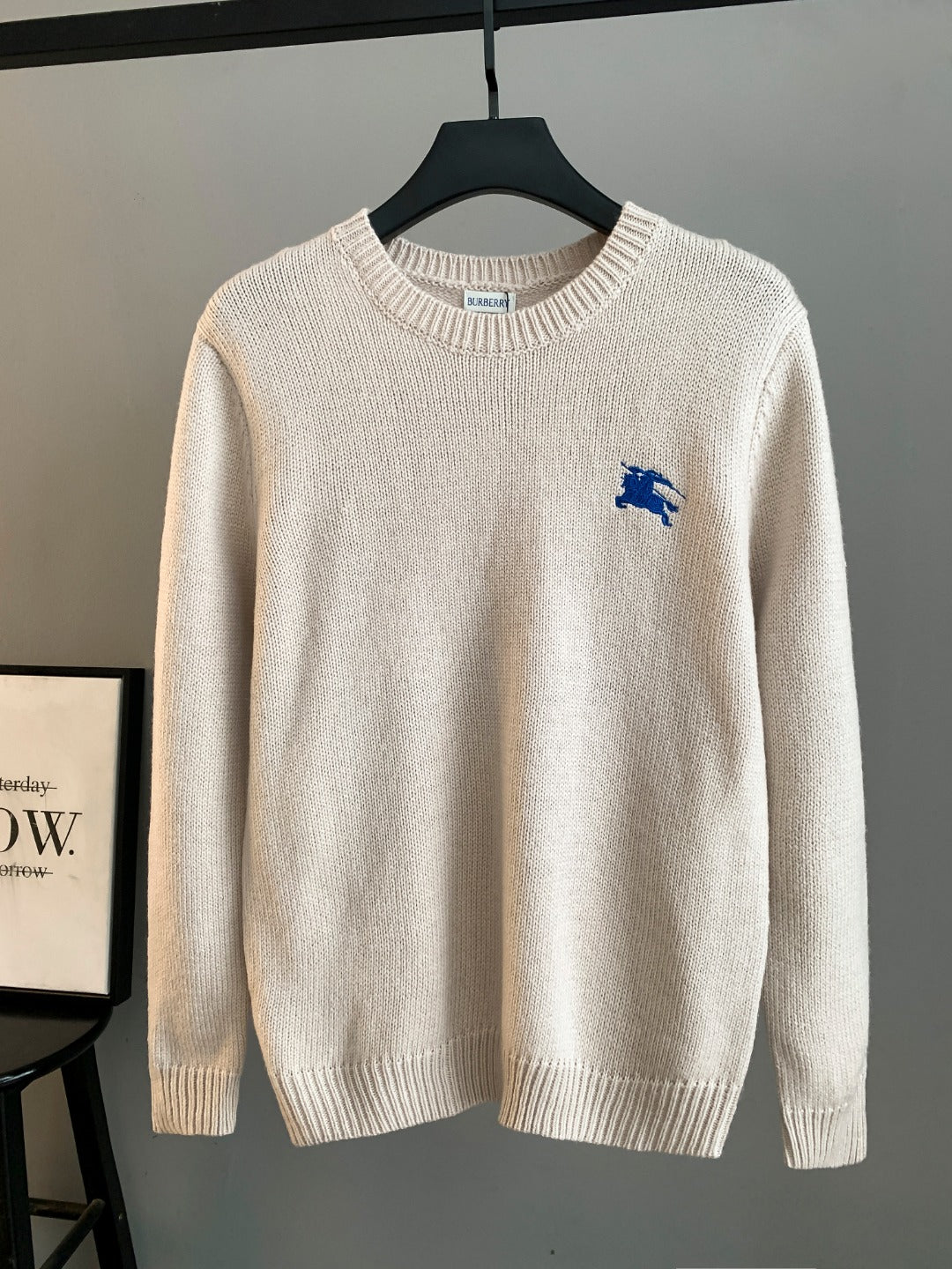 Burberry long sweater, cream knit with small blue horse logo on chest