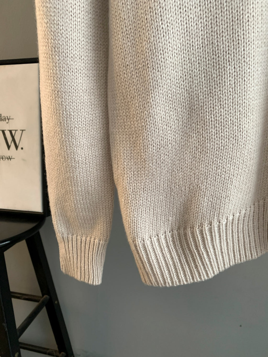 Cream knit long sweater with ribbed hem and cuffs