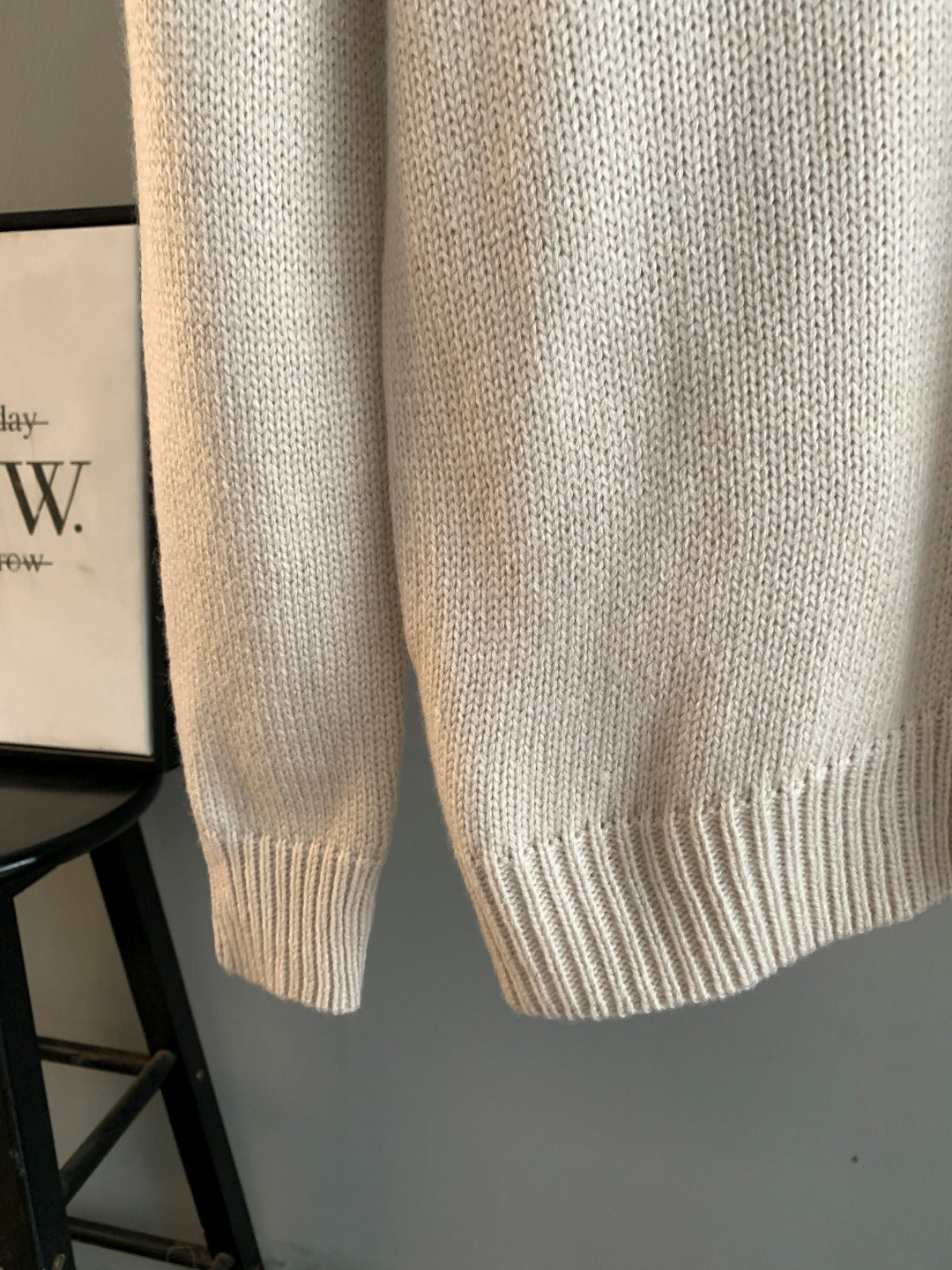 Cream knit long sweater with ribbed hem and cuffs