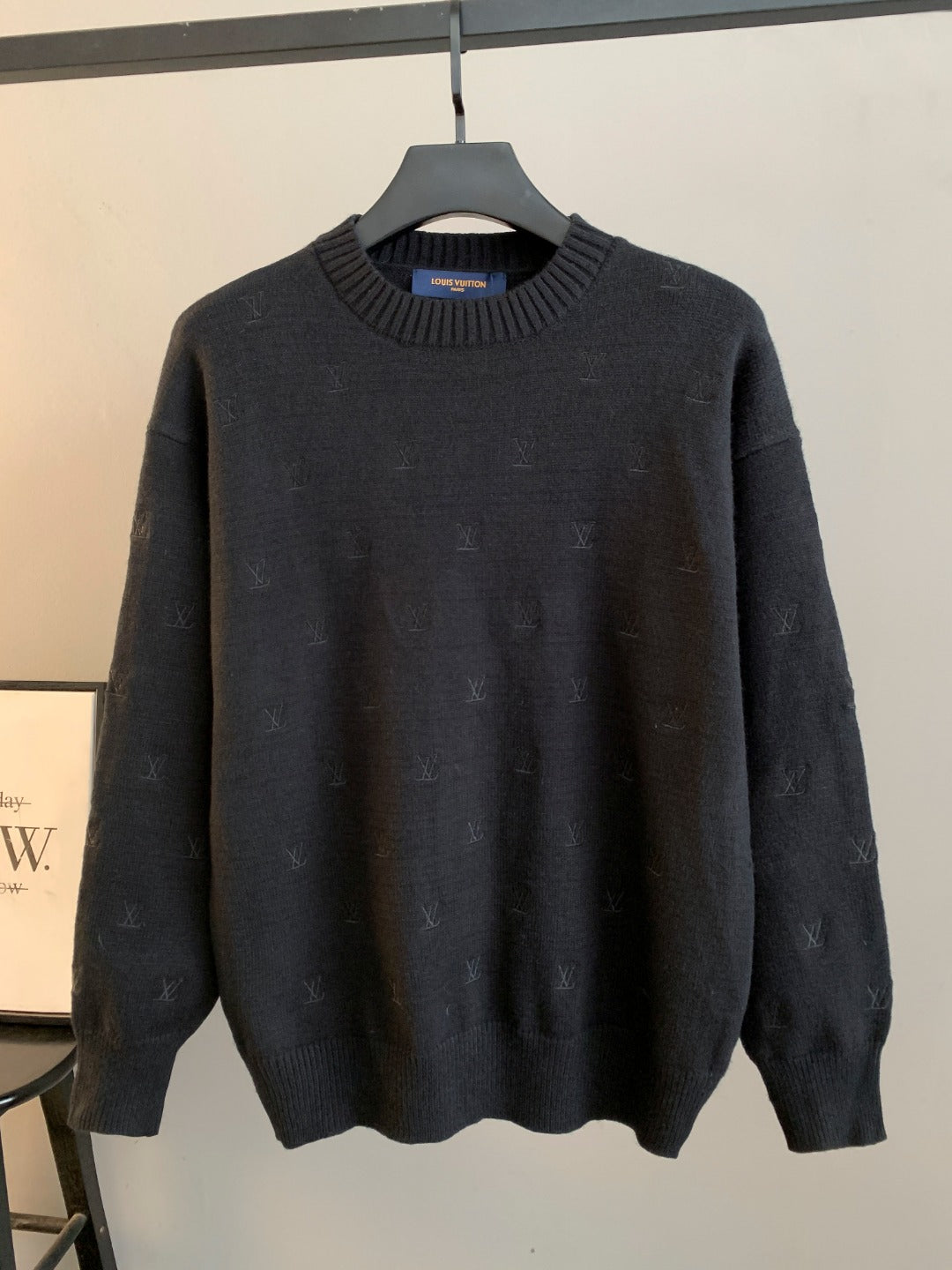 Dark knit sweater with ribbed crew neck and small LV monogram pattern, long sleeve