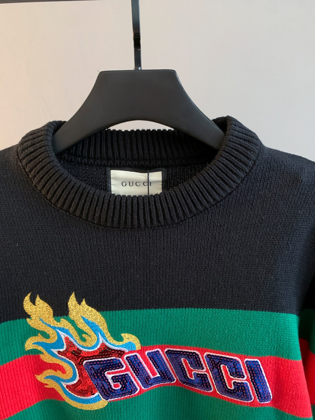 Gucci knit sweater neckline with ribbed crew collar and logo stripe detail