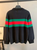 Gucci knit sweater back view, dark base with wide green and red stripe across
