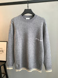 Gray Dior long-sleeve knit sweater with crewneck and striped cuffs