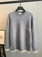 Gray Dior long-sleeve knit sweater with crewneck and striped cuffs