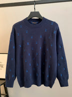 Dark navy knit sweater with blue Louis Vuitton monogram pattern and ribbed crew neck