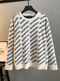 Long-sleeve sweater in cream with black BALENCIAGA logo pattern and ribbed hem