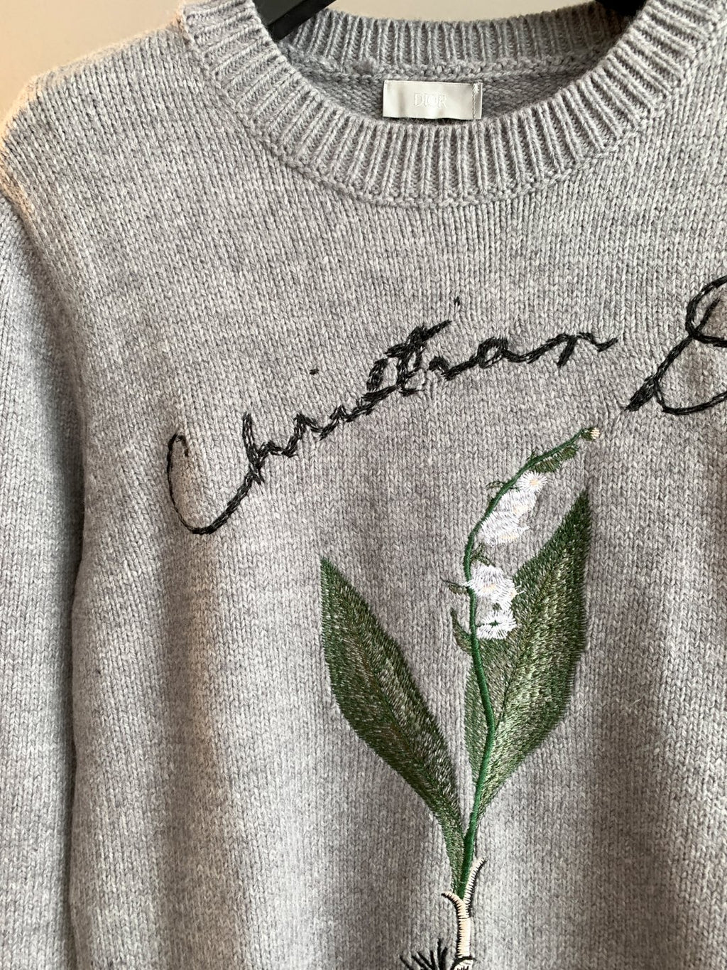 Dior grey knit sweater with green leaf embroidery and script graphic