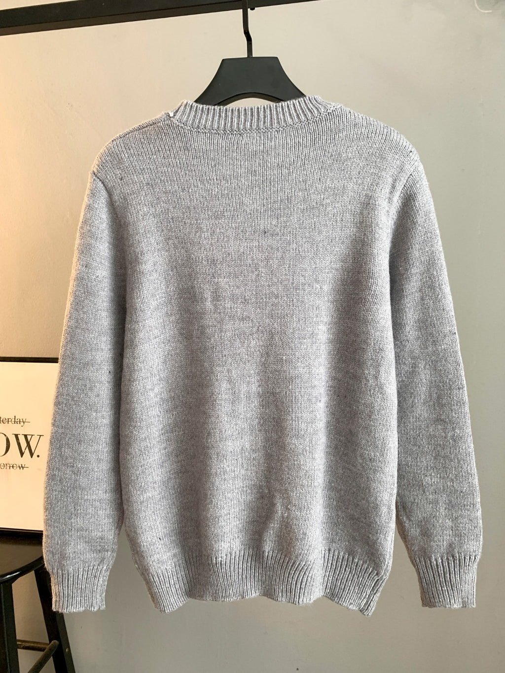 Dior grey knit sweater back view with ribbed crew neckline