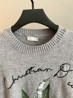 Dior grey knit sweater with ribbed crew neck and embroidered graphic detail