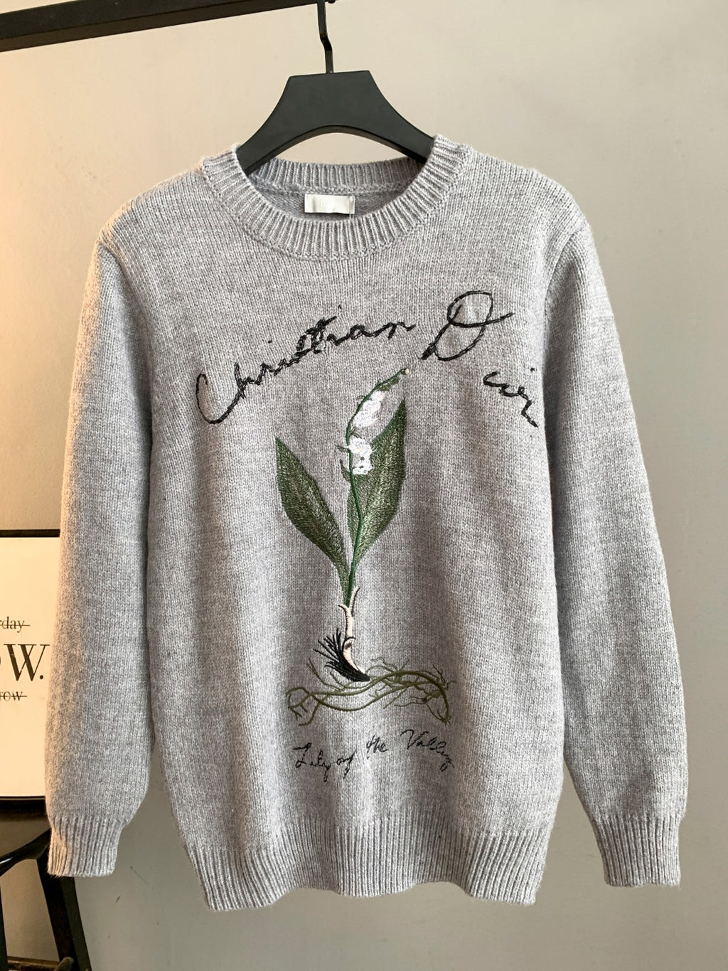 Dior grey knit sweater with embroidered green leaf graphic and crew neck