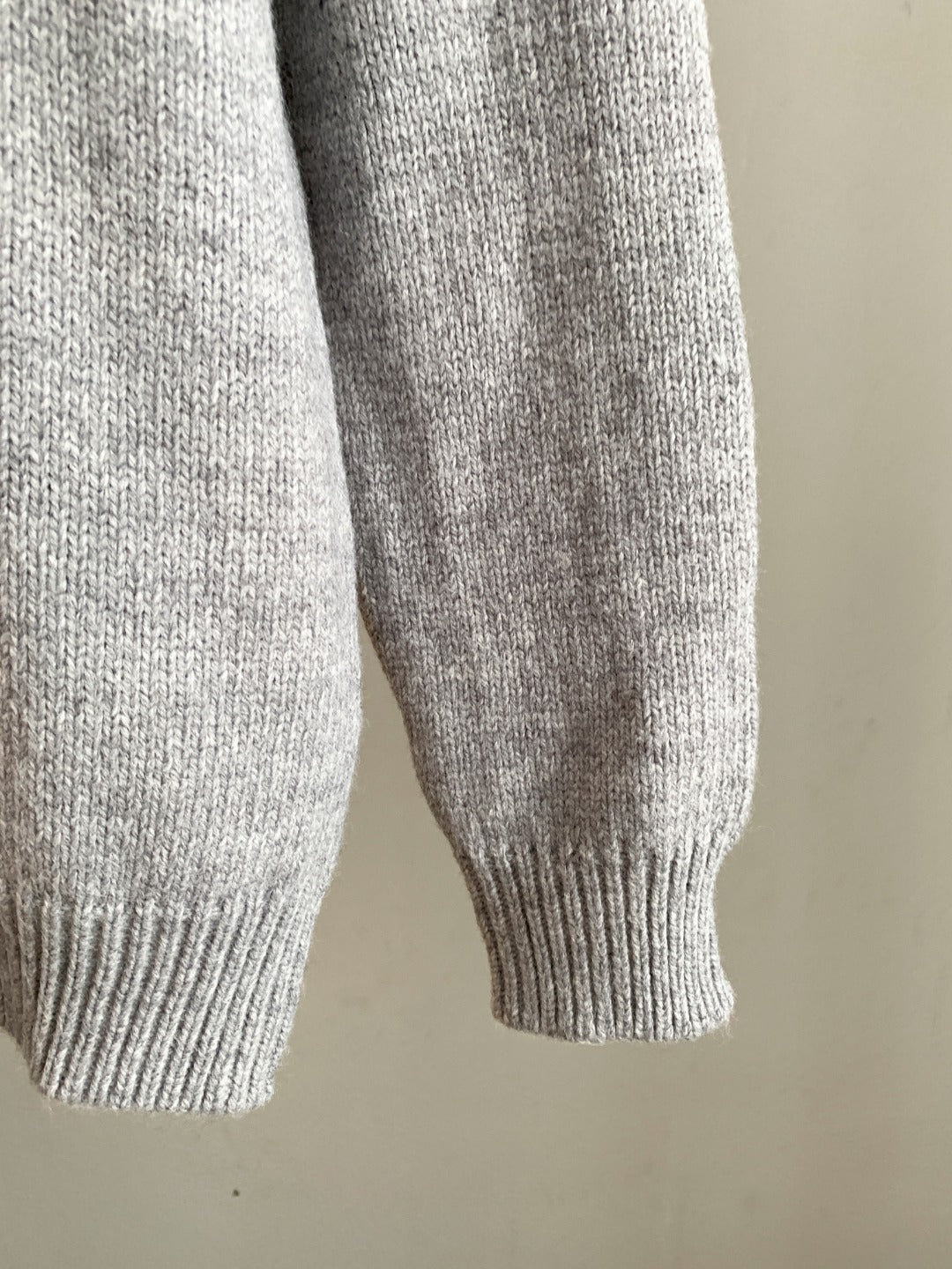 Dior grey knit sweater sleeve with ribbed cuff
