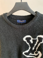 Louis Vuitton long-sleeve sweater neckline detail, dark charcoal with white emblem