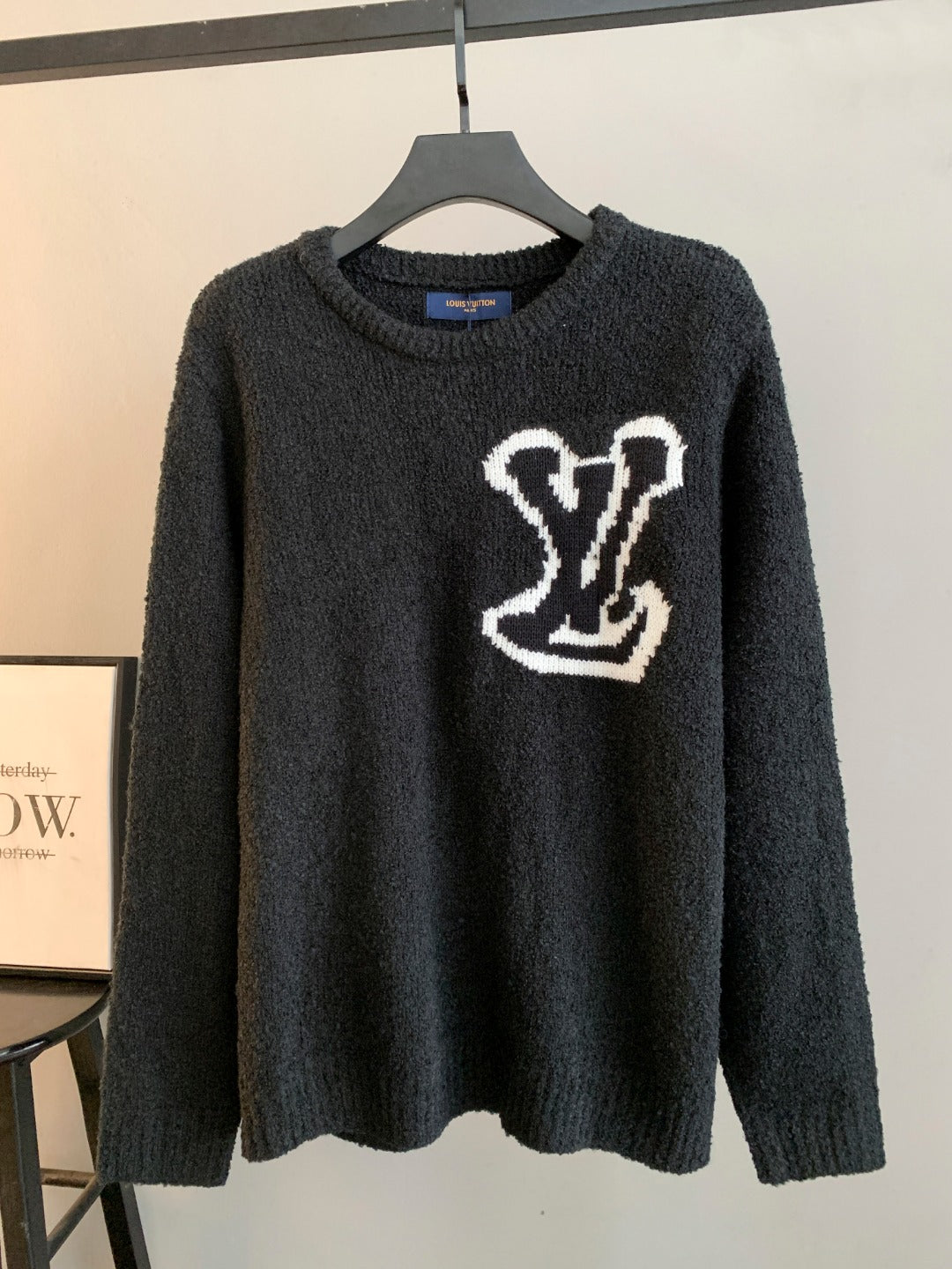 Louis Vuitton long-sleeve sweater, dark charcoal with white emblem on front