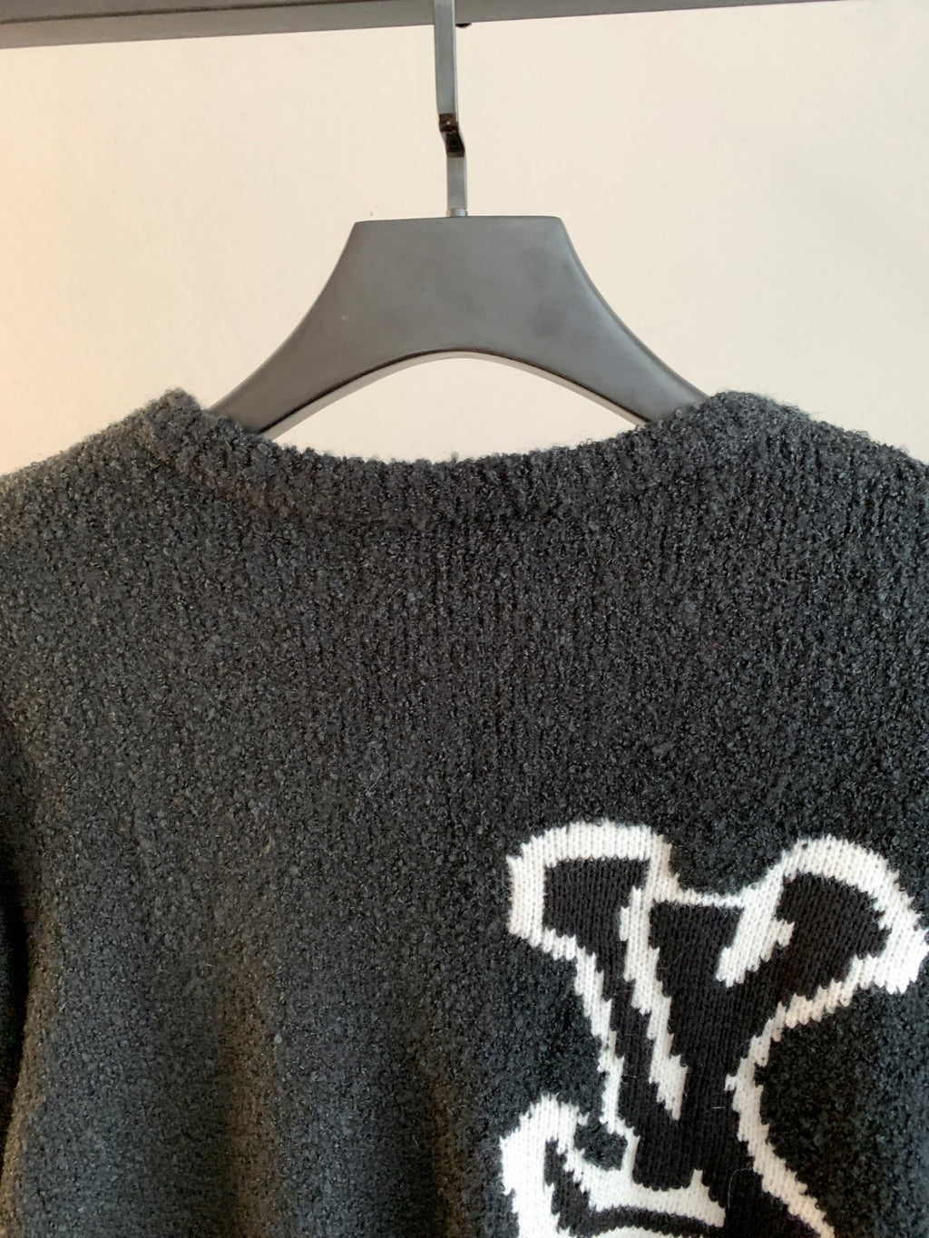 Louis Vuitton long-sleeve sweater back, dark charcoal with white emblem near bottom