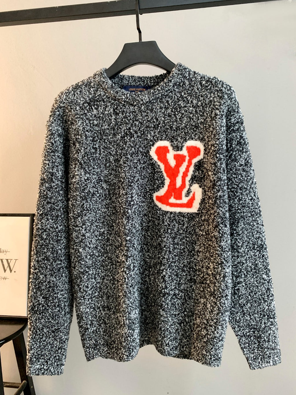 Louis Vuitton knit sweater speckled black/white with red LV graphic on chest