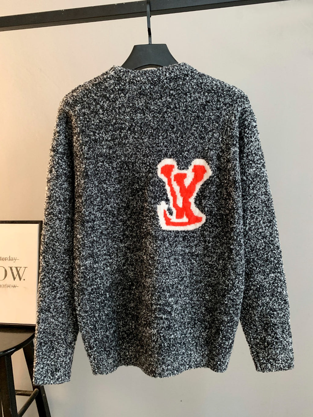 Louis Vuitton knit sweater speckled black/white with red LV logo on back