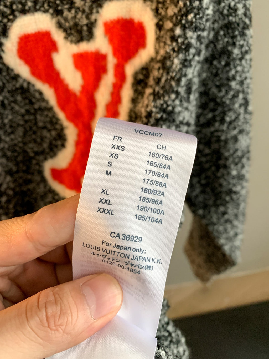Louis Vuitton knit sweater size label tag with measurements