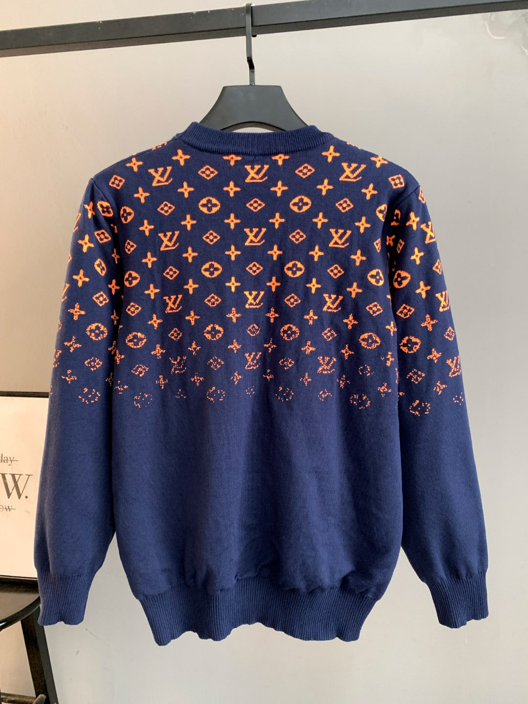 Louis Vuitton logo long-sleeve sweater, back view, navy with orange monogram pattern