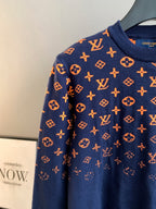 Louis Vuitton logo sweater side view in navy with orange monogram pattern