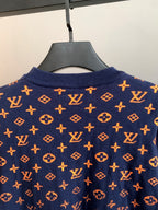 Louis Vuitton logo sweater collar with orange monogram pattern on navy