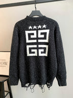 Black cardigan back with large white star and geometric logo print; fringe hem.