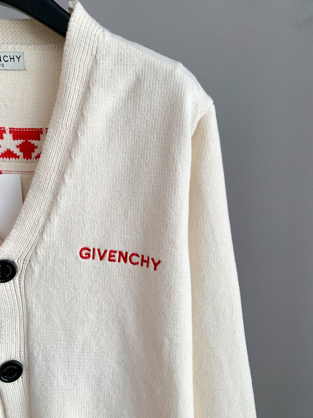 White knit cardigan with red GIVENCHY logo embroidery on chest