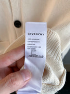White knit cardigan care label tag with GIVENCHY and Made in Portugal