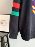 Gucci knit sweater hem and sleeve stripes in green and red, dark gray knit