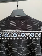 Upper front view crew-neck knit sweater with white geometric monogram pattern