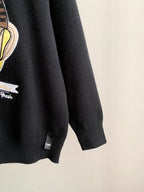 Black Fendi crewneck sweater sleeve hem with small brand tag